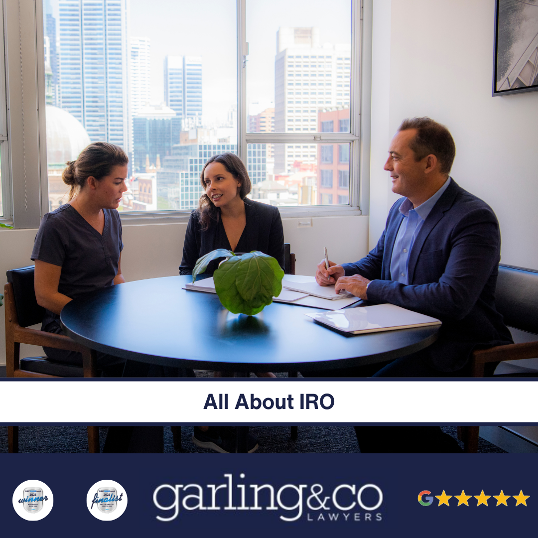 A group of people sitting at a table with the words all about IRO.