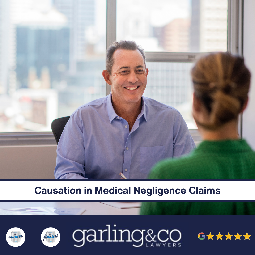 A man across a desk from a women smiling with a backdrop of the Sydney CBD.